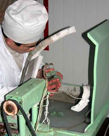 Jade Factory Worker using grinding wheel